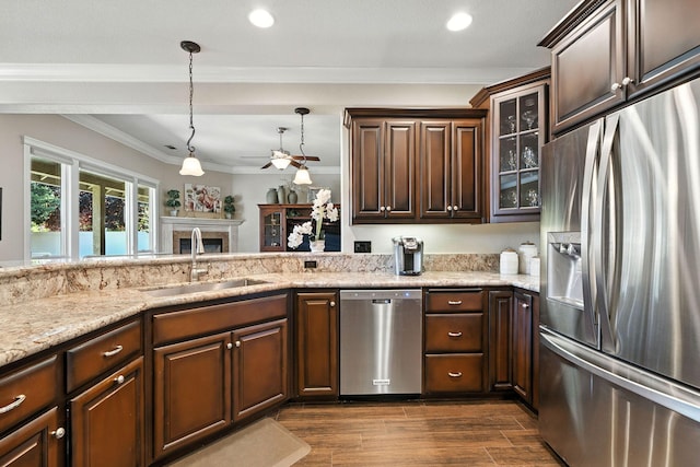 2110 Cilantro Dr, Redding, CA 96003 - kitchen featuring appliances with stainless steel finishes, glass insert cabinets, dark brown cabinetry, light stone counters, and ornamental molding