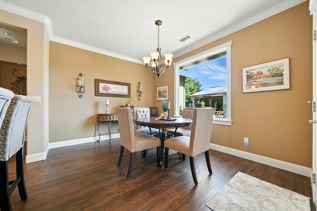 2110 Cilantro Dr, Redding, CA 96003 - dining space with a chandelier, crown molding, and dark wood-type flooring