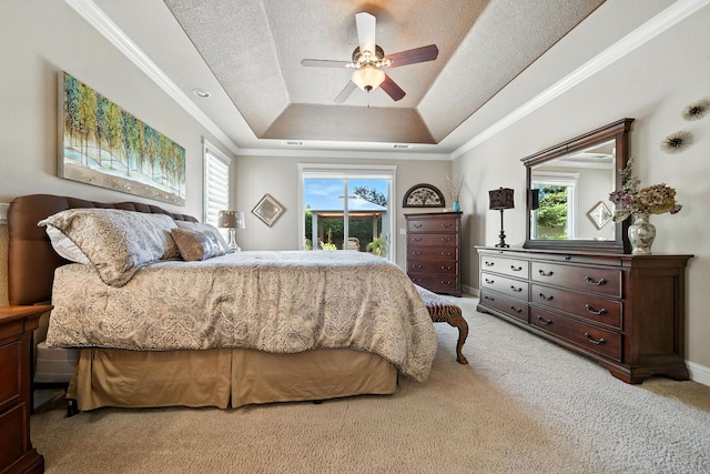 2110 Cilantro Dr, Redding, CA 96003 - bedroom with light colored carpet, a raised ceiling, access to exterior, ceiling fan, and ornamental molding