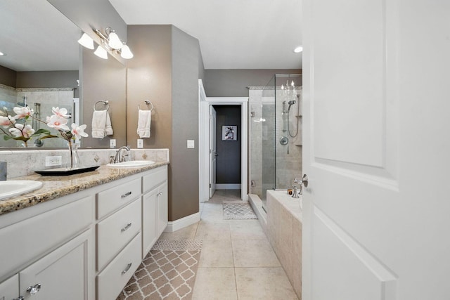 2110 Cilantro Dr, Redding, CA 96003 - full bathroom featuring double vanity, a stall shower, tile patterned floors, and recessed lighting