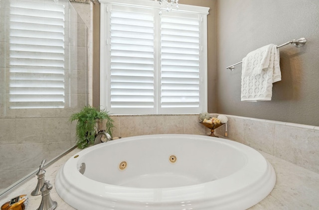2110 Cilantro Dr, Redding, CA 96003 - full bathroom featuring a jetted tub and healthy amount of natural light