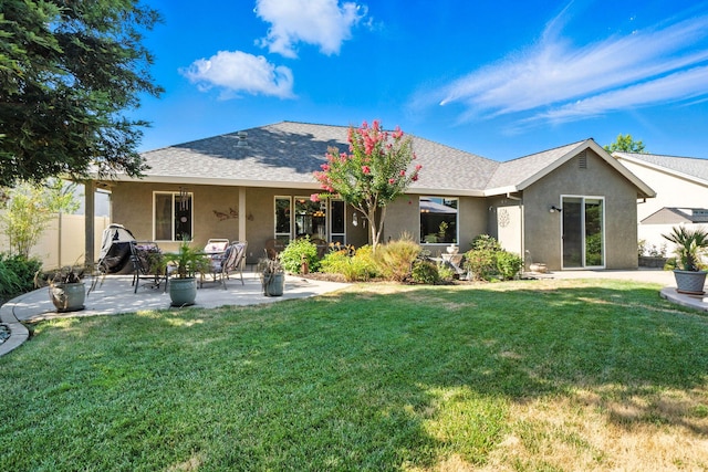 2110 Cilantro Dr, Redding, CA 96003 - rear view of property with stucco siding, a yard, a patio area, and roof with shingles