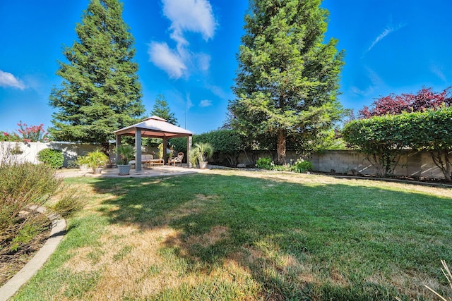 2110 Cilantro Dr, Redding, CA 96003 - fenced backyard with a gazebo and a patio area