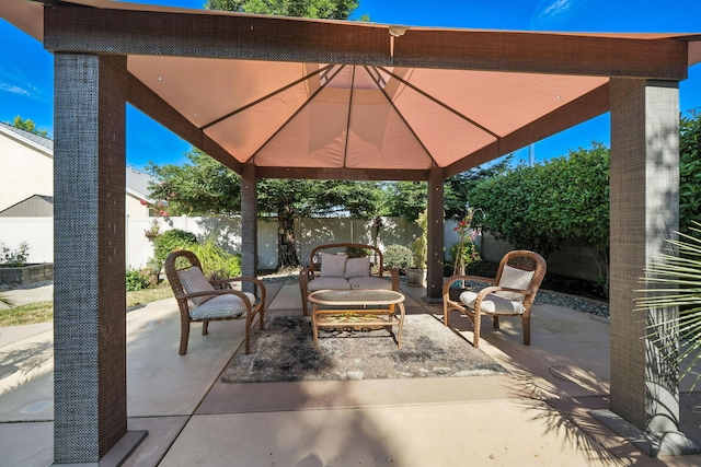 2110 Cilantro Dr, Redding, CA 96003 - fenced backyard featuring a gazebo, a patio, and an outdoor living space