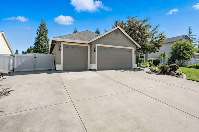 2110 Cilantro Dr, Redding, CA 96003 - ranch-style home with a gate, a garage, stucco siding, and concrete driveway