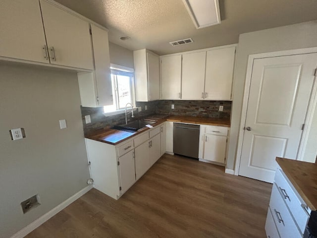 3995 Vassar Way, Shasta Lake, CA 96019 - kitchen featuring dishwasher, wood counters, backsplash, white cabinetry, and a textured ceiling