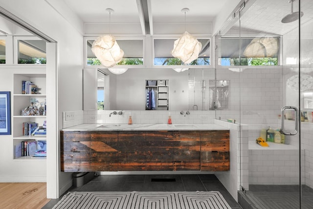 3540 Scenic Dr, Redding, CA 96001 - bathroom featuring double vanity, a shower stall, and decorative backsplash