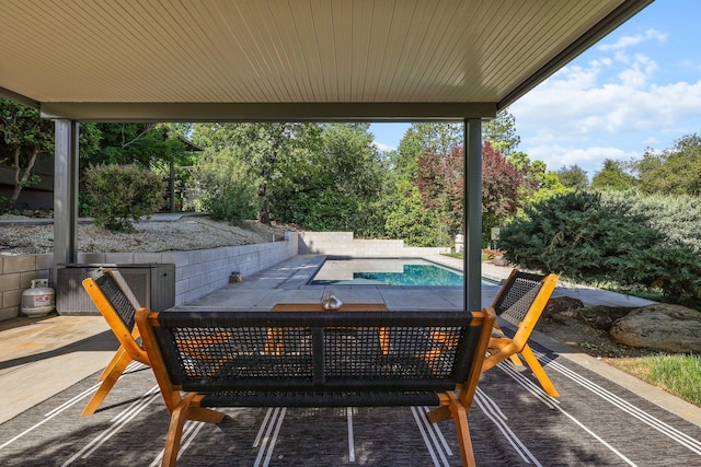 3540 Scenic Dr, Redding, CA 96001 - view of patio featuring a hot tub and outdoor dining area