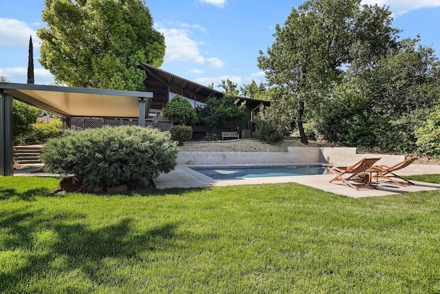 3540 Scenic Dr, Redding, CA 96001 - view of grassy yard with a patio and an outdoor pool
