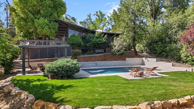 3540 Scenic Dr, Redding, CA 96001 - rear view of house featuring a patio area, a yard, and an outdoor pool