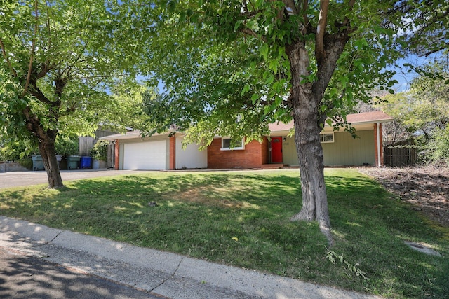 2920 Pioneer Dr, Redding, CA 96001 - view of front of property featuring an attached garage, driveway, and brick siding