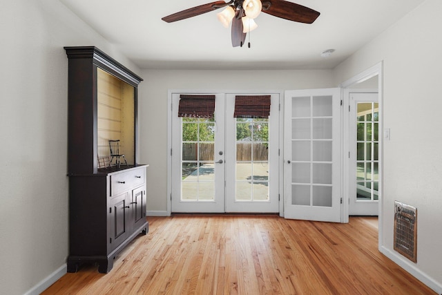2920 Pioneer Dr, Redding, CA 96001 - entryway with french doors, a ceiling fan, plenty of natural light, and light wood-type flooring