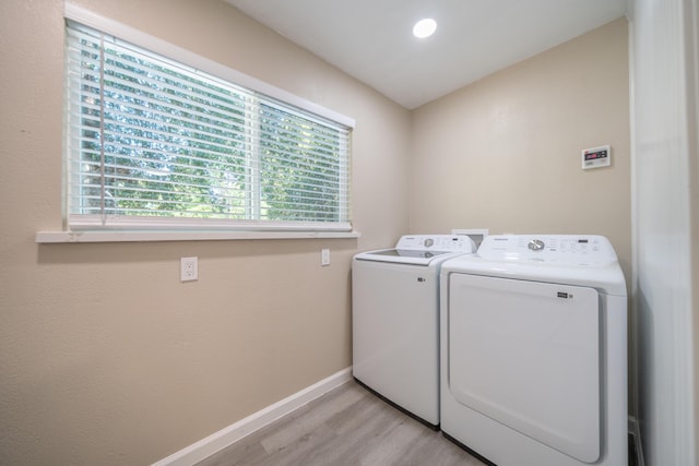 4725 Cedars Rd, Redding, CA 96001 - laundry room featuring separate washer and dryer and light wood finished floors