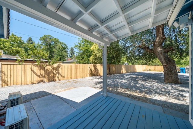 4725 Cedars Rd, Redding, CA 96001 - wooden terrace featuring a patio area and a fenced backyard