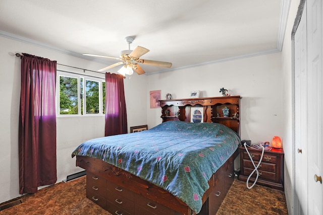 2196 Victor Ave, Redding, CA 96002 - bedroom with crown molding, a ceiling fan, and dark carpet
