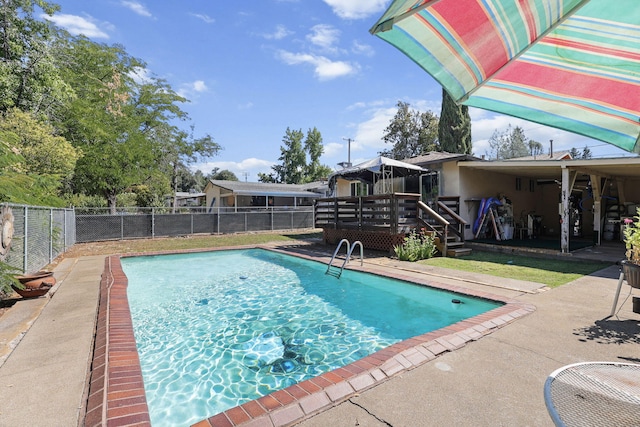 2196 Victor Ave, Redding, CA 96002 - view of pool featuring a wooden deck and a patio
