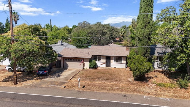 2196 Victor Ave, Redding, CA 96002 - ranch-style home featuring a garage, roof with shingles, and concrete driveway