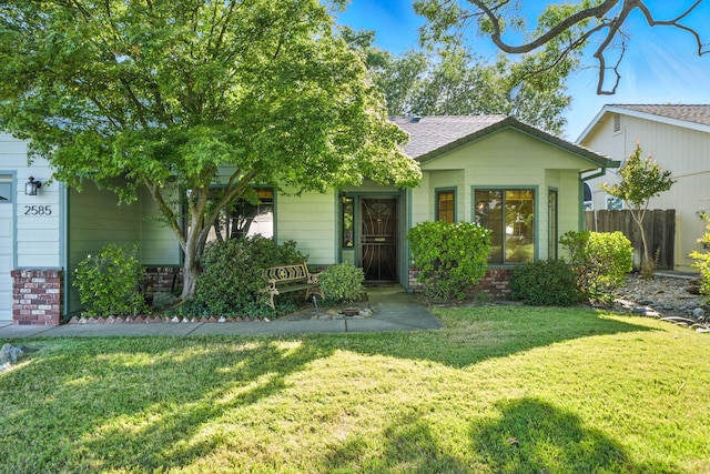 2585 Meadowview Dr, Red Bluff, CA 96080 - view of front facade with brick siding and roof with shingles