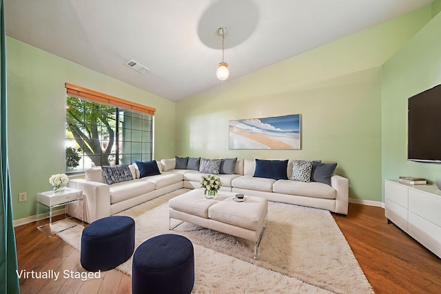 2585 Meadowview Dr, Red Bluff, CA 96080 - living room featuring wood finished floors and vaulted ceiling