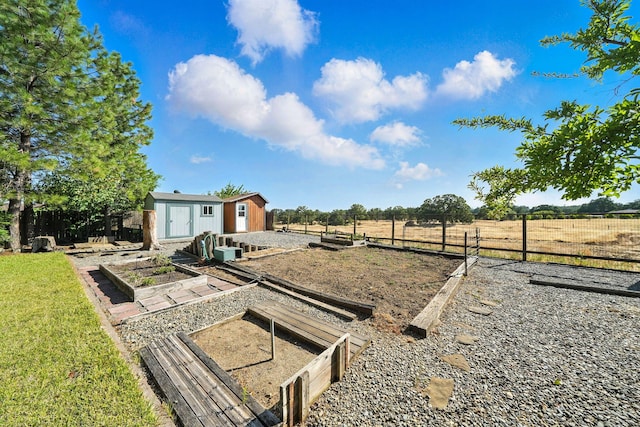 2585 Meadowview Dr, Red Bluff, CA 96080 - view of yard with a garden, a shed, and a view of rural / pastoral area