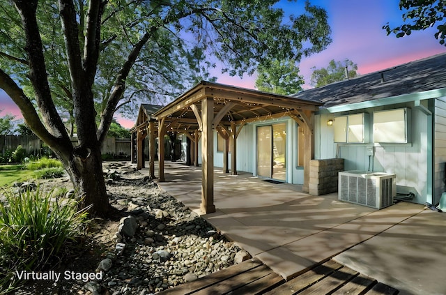 2585 Meadowview Dr, Red Bluff, CA 96080 - patio terrace at dusk featuring a patio