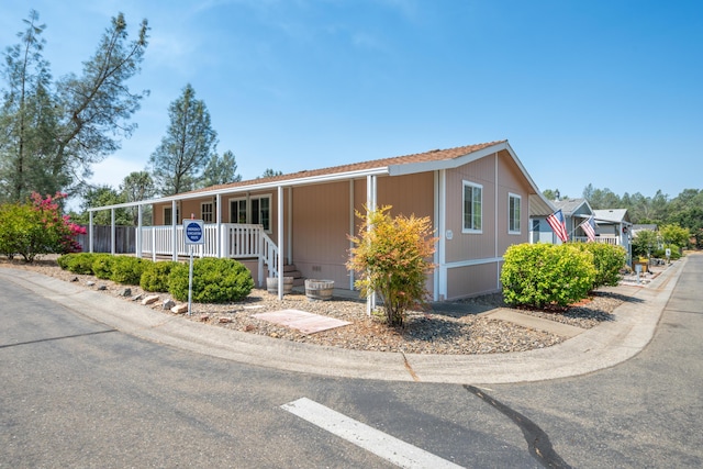 3304 Shasta Dam Blvd Unit 173, Shasta Lake, CA 96019 - manufactured / mobile home featuring a porch