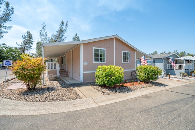 3304 Shasta Dam Blvd Unit 173, Shasta Lake, CA 96019 - manufactured / mobile home featuring a carport