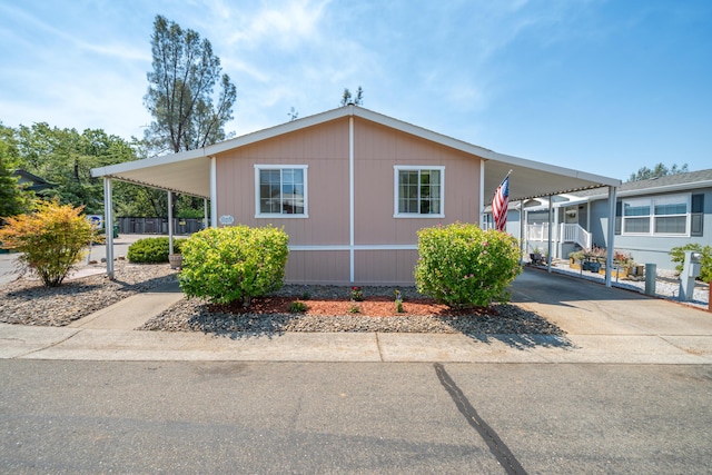 3304 Shasta Dam Blvd Unit 173, Shasta Lake, CA 96019 - manufactured / mobile home with a carport and concrete driveway