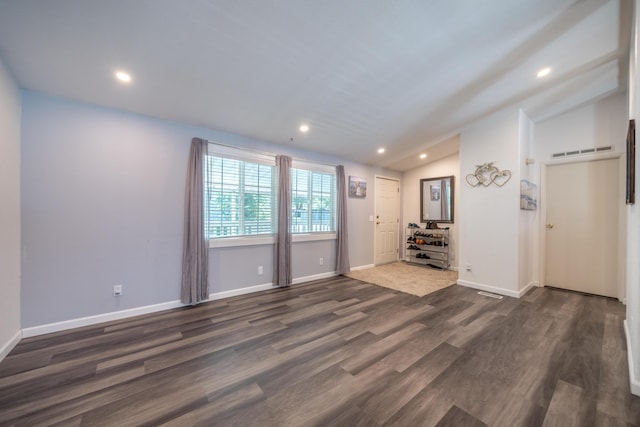 3304 Shasta Dam Blvd Unit 173, Shasta Lake, CA 96019 - unfurnished living room featuring vaulted ceiling, dark wood-style flooring, and recessed lighting