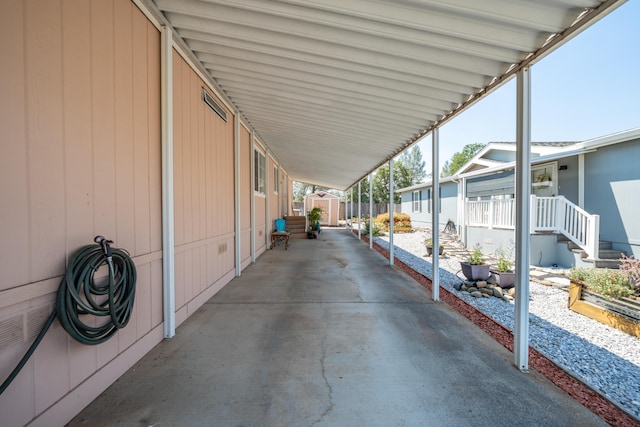 3304 Shasta Dam Blvd Unit 173, Shasta Lake, CA 96019 - view of patio / terrace with a storage unit and an attached carport