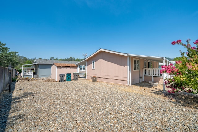 3304 Shasta Dam Blvd Unit 173, Shasta Lake, CA 96019 - back of property featuring a shed and covered porch