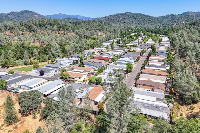 3304 Shasta Dam Blvd Unit 173, Shasta Lake, CA 96019 - aerial view of residential area with a forest and a mountainous background