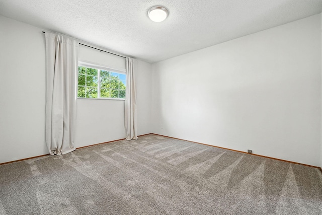 1520 Minor St, Redding, CA 96002 - carpeted spare room with a textured ceiling and baseboards