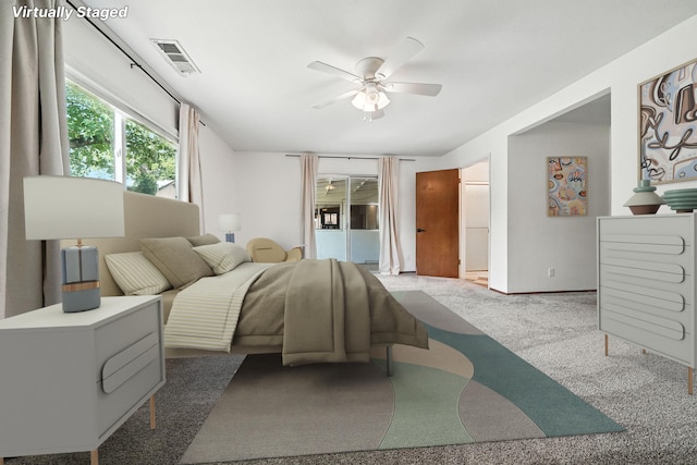 1520 Minor St, Redding, CA 96002 - carpeted bedroom with ceiling fan and access to outside
