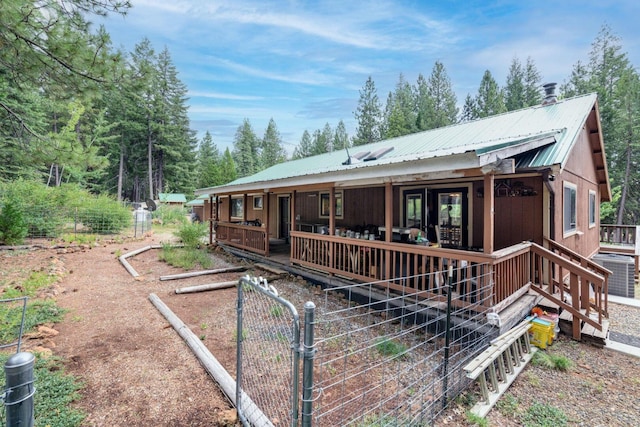 36088 Deer Flat Rd, Shingletown, CA 96088 - view of front of home with a metal roof and a gate