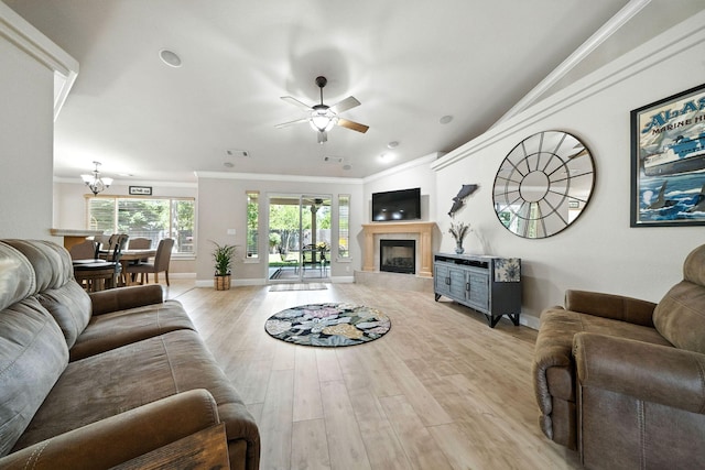 2072 Button Pl, Redding, CA 96002 - living area with a ceiling fan, a fireplace, crown molding, light wood finished floors, and a chandelier