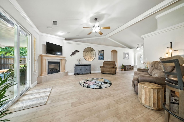 2072 Button Pl, Redding, CA 96002 - living room featuring ceiling fan, a fireplace, arched walkways, lofted ceiling, and wood finished floors