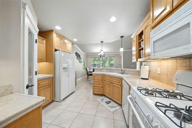 2072 Button Pl, Redding, CA 96002 - kitchen featuring white appliances, a peninsula, backsplash, recessed lighting, and light tile patterned floors