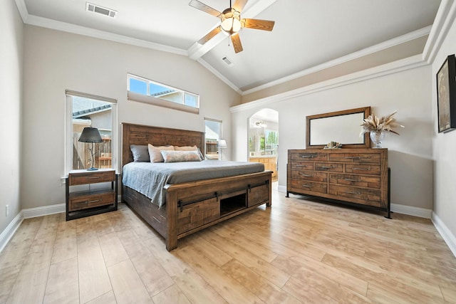 2072 Button Pl, Redding, CA 96002 - bedroom featuring arched walkways, light wood-style floors, vaulted ceiling, ceiling fan, and connected bathroom