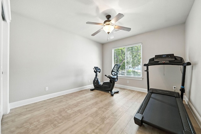 2072 Button Pl, Redding, CA 96002 - workout room with a ceiling fan and light wood-style flooring