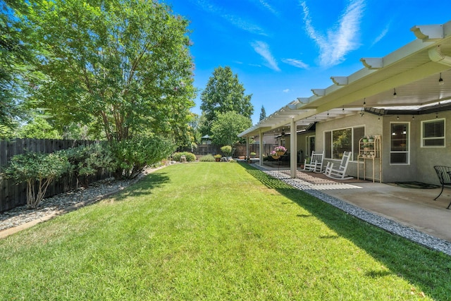 2072 Button Pl, Redding, CA 96002 - fenced backyard featuring a patio
