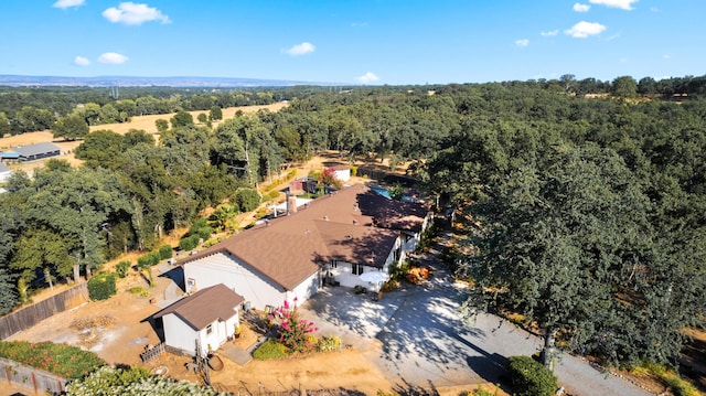 14480 Warren Ave, Red Bluff, CA 96080 - aerial view of property and surrounding area featuring a heavily wooded area