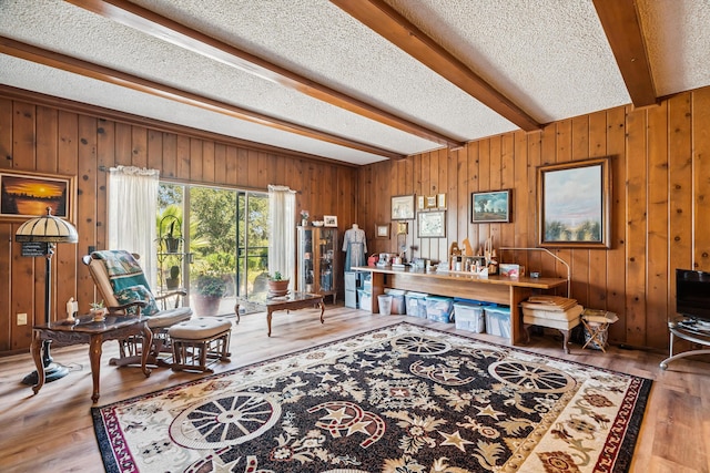 14480 Warren Ave, Red Bluff, CA 96080 - office featuring beam ceiling, wooden walls, wood finished floors, and a textured ceiling