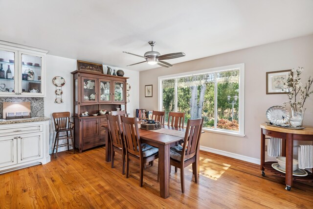14480 Warren Ave, Red Bluff, CA 96080 - dining area featuring a ceiling fan and light wood-type flooring