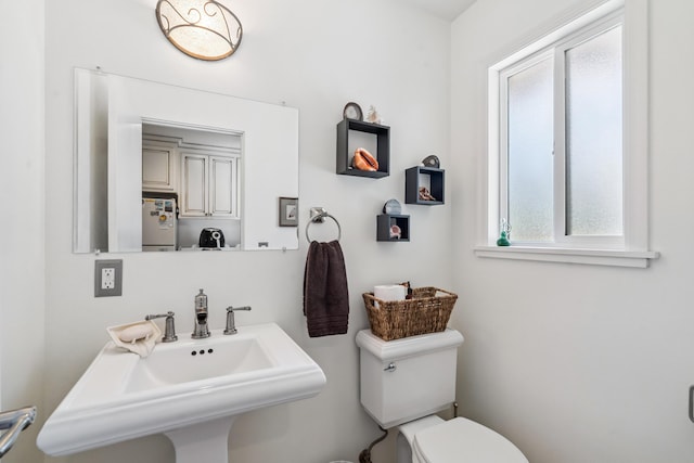 14480 Warren Ave, Red Bluff, CA 96080 - bathroom featuring toilet and a sink