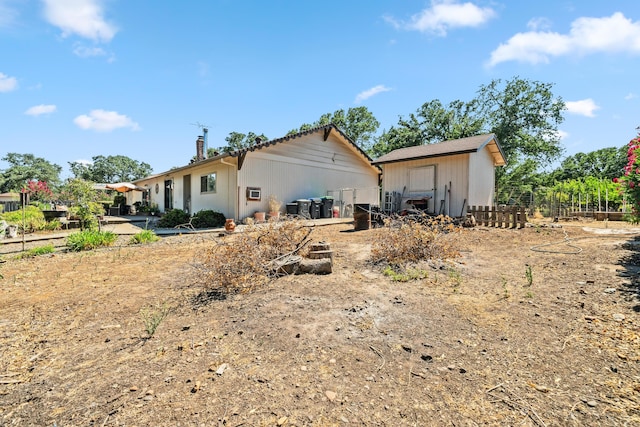 14480 Warren Ave, Red Bluff, CA 96080 - back of property with a storage unit and a chimney