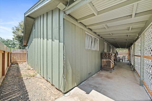 4215 Oro St, Redding, CA 96002 - view of side of property with a fenced backyard and board and batten siding