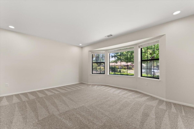 3628 Somerset Ave, Redding, CA 96002 - unfurnished room featuring carpet flooring, healthy amount of natural light, and recessed lighting