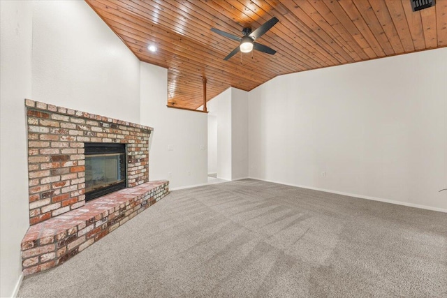 3628 Somerset Ave, Redding, CA 96002 - unfurnished living room featuring wooden ceiling, carpet flooring, a ceiling fan, vaulted ceiling, and a brick fireplace