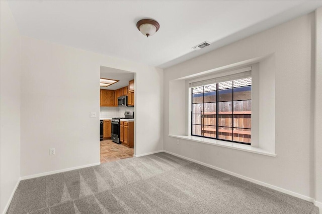 3628 Somerset Ave, Redding, CA 96002 - empty room featuring light colored carpet and baseboards